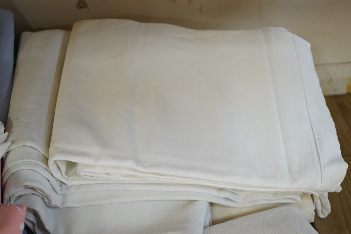 Thirteen mixed French mostly coloured provincial linen sheets some embroidered with monograms, floral embroidery, or decorated with crochet.